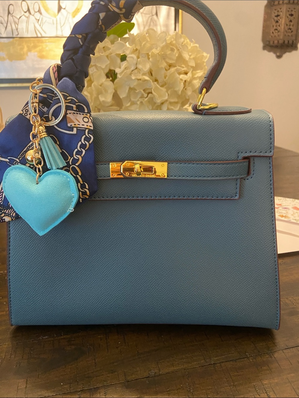 Elegant Blue Leather Top-Handle Bag with Gold Hardware